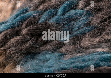 highly detailed needlework wool fabric, close up wool texture background. Stock Photo