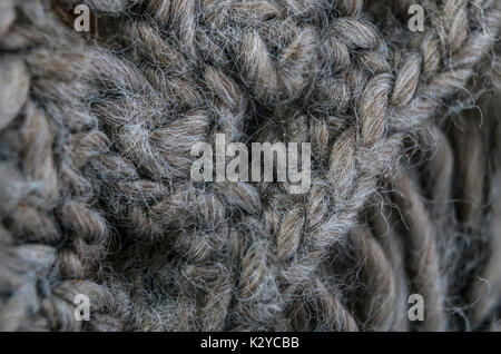 highly detailed needlework wool fabric, close up wool texture background. Stock Photo