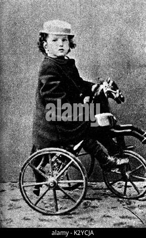 Claude Debussy - portrait as a boy riding his tricycle, in 1867 (aged 5) French composer, 22 August 1862 – 25 March 1918. Stock Photo