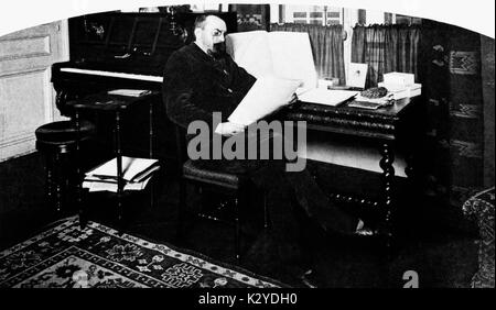 Alfred Bruneau - portrait of French opera composer in his study holding a score, 1902. 3 March 1857 - 15 June 1934. Full name: Louis-Charles-Bonaventure-Alfred Bruneau. Stock Photo