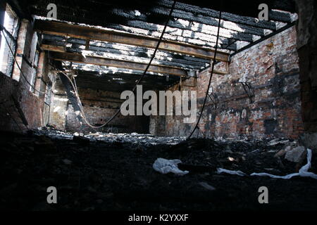 Fire damaged building structural unsafe Stock Photo