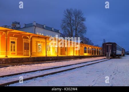 Historic wooden railway station. Night illumination. Haapsalu, Estonia. Stock Photo