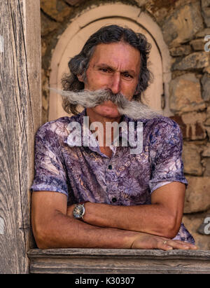 Man in Yerevan, Armenia has not trimmed his mustache for 40 years.  June 15, 2017 Stock Photo