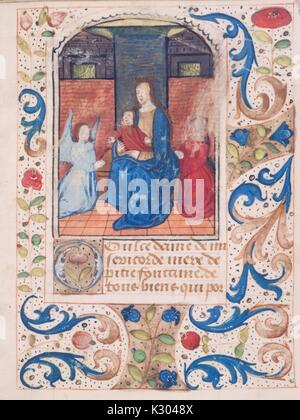 Illuminated manuscript page depicting the Blessed Virgin holding baby Jesus, from the 'Tenere et credere me faciat, ' a 15th century Latin book of hours, 2013. Stock Photo