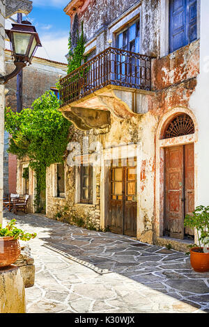 charming old streets of traditional greek villages - Chalki in Naxos island, Cyclades Stock Photo