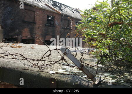 Fire damaged building structural unsafe Stock Photo