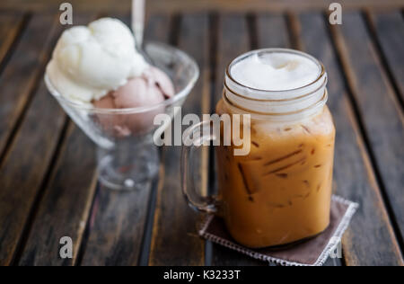 Glass Mason Jar With Ice Coffee On Wood Table Selective Focus On