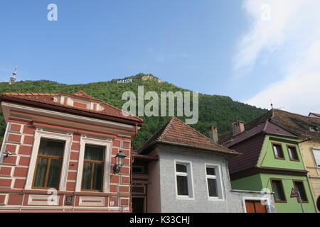 Brasov, administrative center of Brasov country, has lots old Gothic houses, well-kept, popular tourist destination. Stock Photo