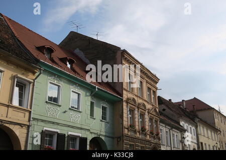 Brasov, administrative center of Brasov country, has lots old Gothic houses, well-kept, popular tourist destination. Stock Photo