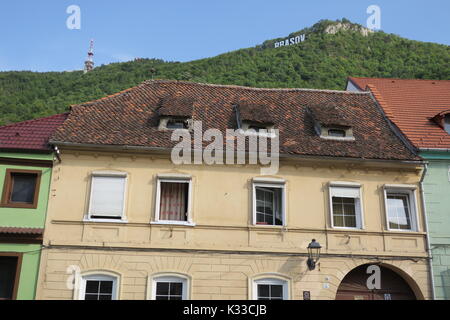 Brasov, administrative center of Brasov country, has lots old Gothic houses, well-kept, popular tourist destination. Stock Photo