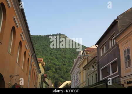 Brasov, administrative center of Brasov country, has lots old Gothic houses, well-kept, popular tourist destination. Stock Photo