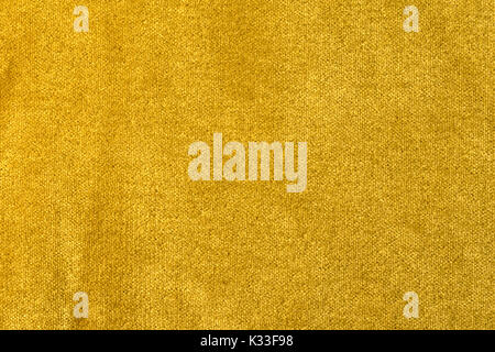 Golden angora goat velours fabric resembling velvet, mixed with natural silk threads. mohair textile. cashmere, velvet suede and chamois effect. for u Stock Photo