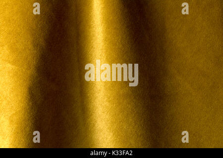 Golden angora goat velours textile resembling velvet, mixed with natural silk threads. mohair textile. cashmere, velvet suede and chamois effect. for  Stock Photo