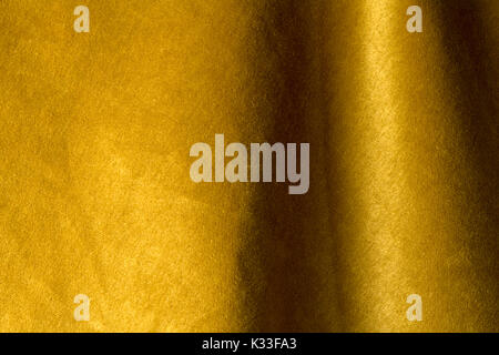 Golden angora goat velours fabric resembling velvet, mixed with natural silk threads. mohair textile. cashmere, velvet suede and chamois effect. for u Stock Photo