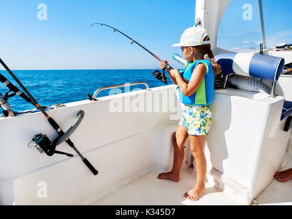 Little girl fishing pole hi-res stock photography and images - Alamy