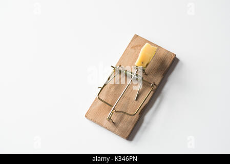 Mouse trap with cheese isolated on white, top view Stock Photo