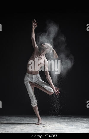 Young man practicing yoga on white background Stock Photo
