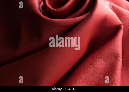 Seamless genuine Italian red leather texture background, fashionable real leather. Stock Photo