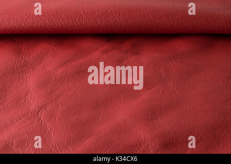 Seamless genuine Italian red leather texture background, fashionable real leather. Stock Photo