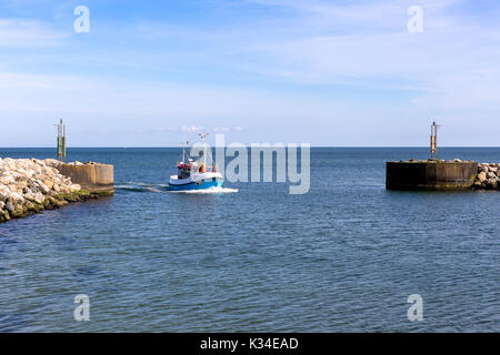 Fishing boat in the harbor of the little danish village Aalbæk near Skagen in the Area of Kattegat Stock Photo