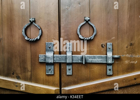 wooden gates closed on the bolt Stock Photo