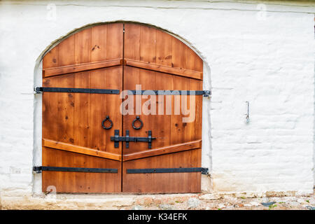 wooden gates closed on the bolt Stock Photo