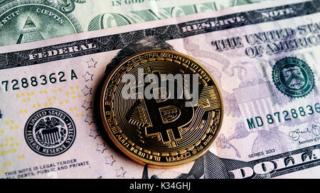 Bitcoin on five dollar banknote. Trading concept . Stock Photo