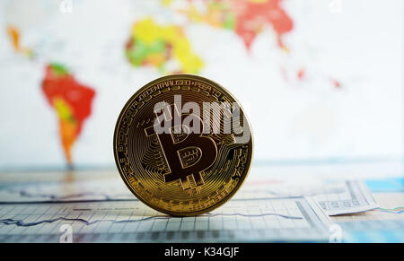 Bitcoin currency on a world map  background Stock Photo
