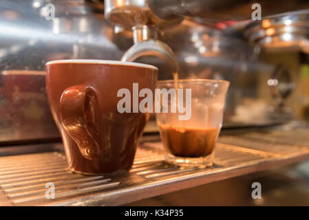 coffee brewing from a coffee machine in Sydney Stock Photo
