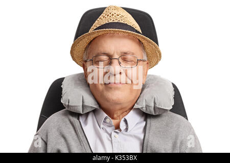 Mature man with a neck pillow sleeping in a seat isolated on white background Stock Photo