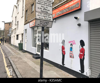 Photo Must Be Credited ©Alpha Press 066465 18/12/2016 Harry's Girl, street art by artist Pegasus depicting Prince Harry's new girlfriend Meghan Markle with two Queen's Guards standing to attention either side of her, on a wall in North London. Stock Photo