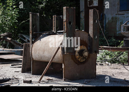 Old rusty metal tank for heating water Stock Photo