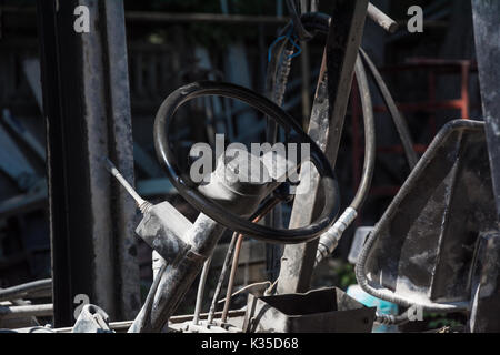 Steering wheel of old forklift truck Stock Photo