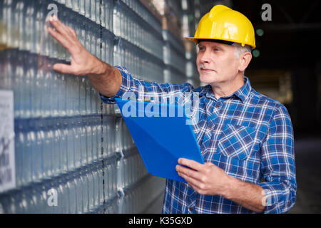 Checking the merchandise that will be sent to the client Stock Photo