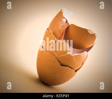 Scattered broken egg shells isolated in white background Stock Photo