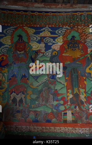 Buddhist wall paintings in Choede Gompa, Lo Manthang in Upper Mustang, Nepal Stock Photo