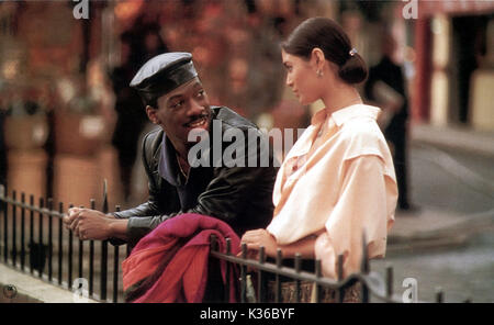 THE GOLDEN CHILD EDDIE MURPHY AND CHARLOTTE LEWIS A PARAMOUNT PICTURE     Date: 1986 Stock Photo