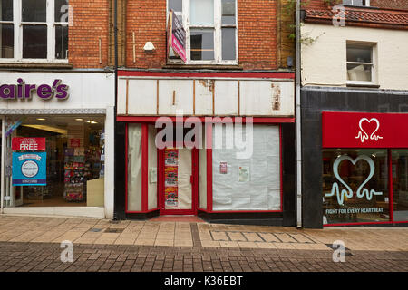 YEOVIL, SOMERSET/United Kingdom - August 30 2017: Vacant retail shop premises in Yeovil town center that never recovered fully from the financial crisis. August 30 2017 Stock Photo