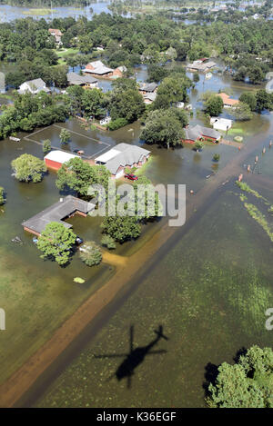 Beaumont, United States. 31st Aug, 2017. A U.S. Air Force 920th Rescue Wing HH-60 Pave Hawk helicopter crew searches for Hurricane Harvey victims in need of evacuation August 31, 2017 in Beaumont, Texas. Credit: Planetpix/Alamy Live News Stock Photo