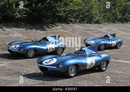 Five historic D-Type Jaguars visit Brooklands circuit, Weybridge, Surrey, England, UK. 1st September 2017. D-Type Jaguars won the Le Mans 24hr endurance race in 1955, 1956 and 1957. In 1957, D-Types were placed 1-2-3-4-6, with only a solitary Ferrari in 5th spoiling the parade. In picture, shown on Members' Banking, car numbered '3' (Ecurie Ecosse, XKD 606) is the 1957 Le Mans winner and car '15' (Ecurie Ecosse, XKD 603) came second. Car '6' (Ecurie Ecosse, XKD 504) was the first long-nose D-Type built. Stock Photo