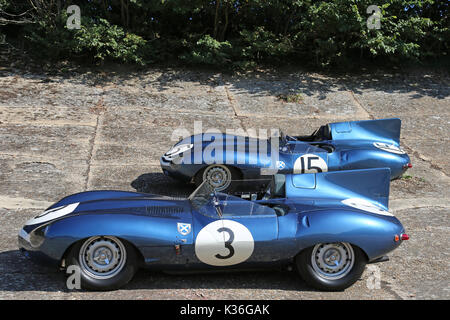 Five historic D-Type Jaguars visit Brooklands circuit, Weybridge, Surrey, England, UK. 1st September 2017. D-Type Jaguars won the Le Mans 24hr endurance race in 1955, 1956 and 1957. In 1957, D-Types were placed 1-2-3-4-6, with only a solitary Ferrari in 5th spoiling the parade. In picture, shown on Members' Banking, car numbered '3' (Ecurie Ecosse, XKD 606, 'long-nose') is the 1957 Le Mans winner and car '15' (Ecurie Ecosse, XKD 603, 'long-nose') came second. Stock Photo