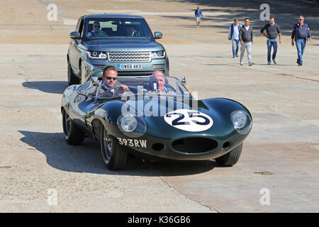 Five historic D-Type Jaguars visit Brooklands circuit, Weybridge, Surrey, England, UK. 1st September 2017. D-Type Jaguars won the Le Mans 24hr endurance race in 1955, 1956 and 1957. In 1957, D-Types were placed 1-2-3-4-6, with only a solitary Ferrari in 5th spoiling the parade. In picture, shown on Finishing Straight, car numbered '25' (Jaguar Works, XKD 605, 'long-nose') was 6th at Le Mans in 1956. Stock Photo