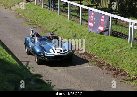 Five historic D-Type Jaguars visit Brooklands circuit, Weybridge, Surrey, England, UK. 1st September 2017. D-Type Jaguars won the Le Mans 24hr endurance race in 1955, 1956 and 1957. In 1957, D-Types were placed 1-2-3-4-6, with only a solitary Ferrari in 5th spoiling the parade. In picture, shown on Test Hill, car '15' (Ecurie Ecosse, XKD 603, 'long-nose') came second at Le Mans in 1957. Stock Photo