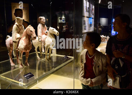 Xi'an, China's Shaanxi Province. 1st Sep, 2017. People visit an exhibition of painted ceramic antiques in the Emperor Qinshihuang's Mausoleum Site Museum in Xi'an, capital of northwest China's Shaanxi Province, Sept. 1, 2017. Credit: Shao Rui/Xinhua/Alamy Live News Stock Photo