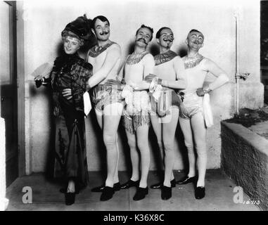 WILLIAM HAINES AND HIS ACROBATIC TROUPE AS THEY APPEARED AT A MASQUERADE COSTUME BALL GIVEN BY MR AND MRS BASIL RATHBONE. PHOTO TAKEN BY W M GRIMES FROM THE RONALD GRANT ARCHIVE Stock Photo