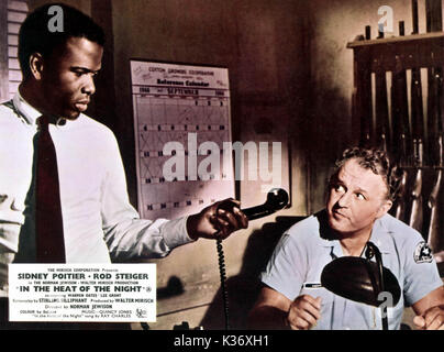 IN THE HEAT OF THE NIGHT SIDNEY POITIER, ROD STEIGER     Date: 1967 Stock Photo