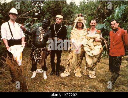 Monty Python's The Meaning of Life (BR1983)  L-R, JOHN CLEESE, TERRY GILLIAM, GRAHAM CHAPMAN, ERIC IDLE, MICHAEL PALIN, TERRY JONES   Monty Python's The Meaning of Life (BR1983) L-R, JOHN CLEESE, TERRY GILLIAM, GRAHAM CHAPMAN, ERIC IDLE, MICHAEL PALIN, TERRY JONES Stock Photo