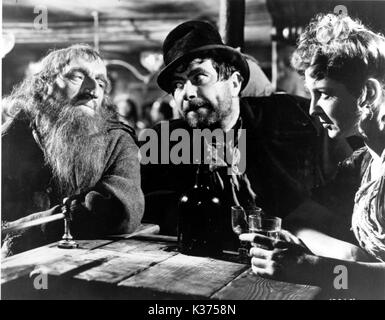 OLIVER TWIST L-R:ALEC GUINNESS, ROBERT NEWTON AND KAY WALSH   OLIVER TWIST Stock Photo