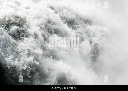 Raging waters of a big waterfall. Stock Photo