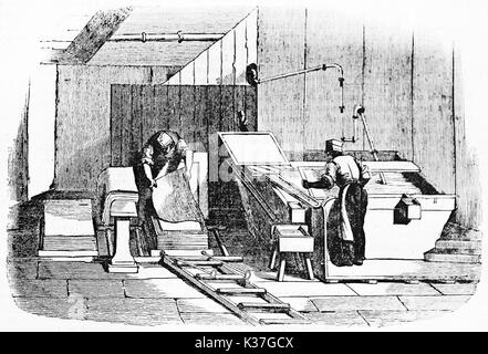 Two men working on a paper sheets production in an ancient paper factory. Old Illustration by unidentified author, published on Magasin Pittoresque, Paris, 1834 Stock Photo